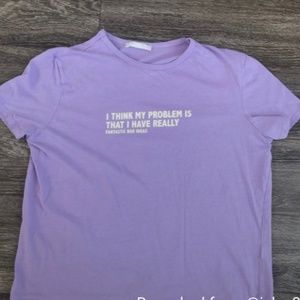 Woman Zara Front Text T-Shirt Fit- S/Med Tag says Lg.